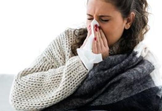 sneezing woman
