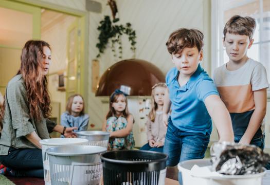 Children learning how to recycle garbage | Merry Maids