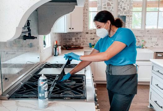 Merry Maid Cleaning Stove